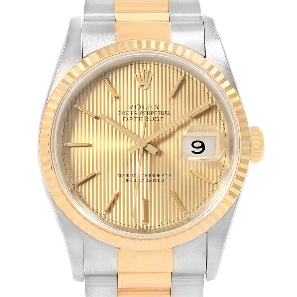 This image shows a front view of a Rolex Datejust 16233 Men's Steel and Gold (two tone) Champagne Dial 16233 Men's Steel and Gold (two tone) Champagne Dial watch, showcasing the face, hands, date window, and part of the bracelet.