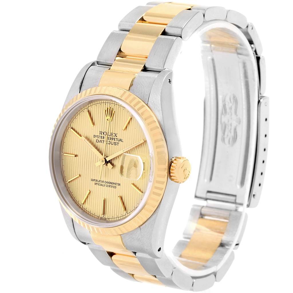 The Rolex Datejust 16233 Men's Steel and Gold (two tone) Champagne Dial 16233 Men's Steel and Gold (two tone) Champagne Dial watch is displayed at a slight angle, showing the dial, bezel, crown, and parts of the bracelet.