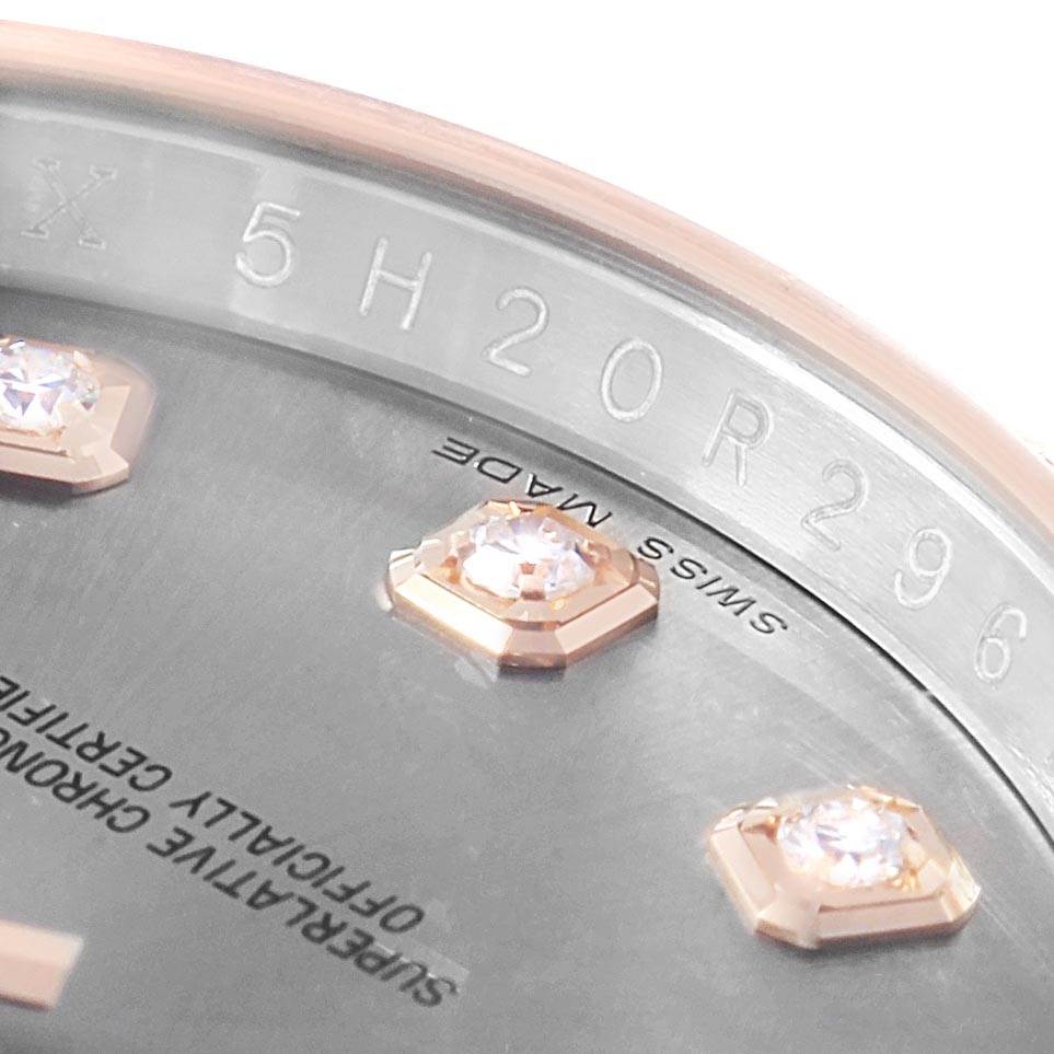 The image shows a close-up of the dial and diamond markers of a Rolex Datejust 116231 Men's Steel and Gold (two tone) Grey Dial 116231 Men's Steel and Gold (two tone) Grey Dial, including the "Swiss Made" text and serial number engraving.