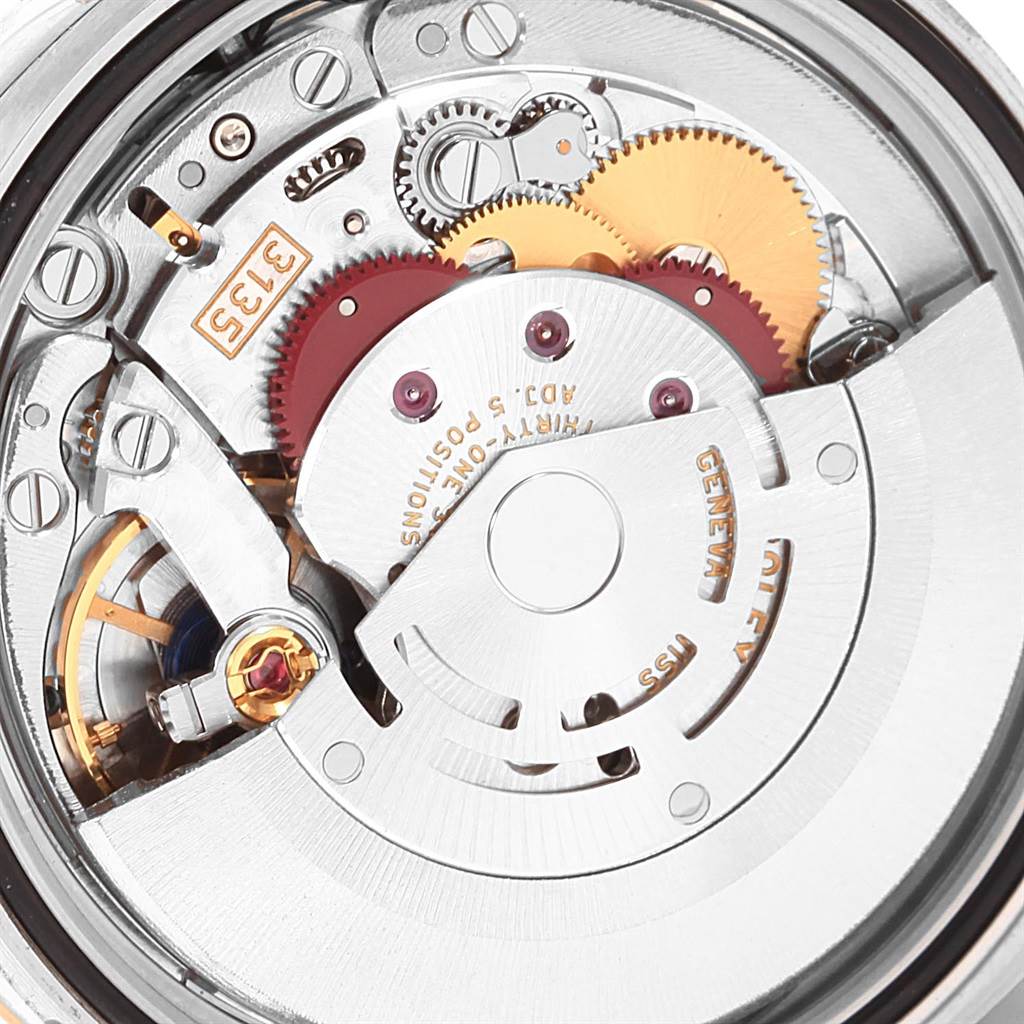 This image shows a close-up view of the inner mechanical movement of a Rolex Datejust 116231 Men's Steel and Gold (two tone) Grey Dial 116231 Men's Steel and Gold (two tone) Grey Dial watch.