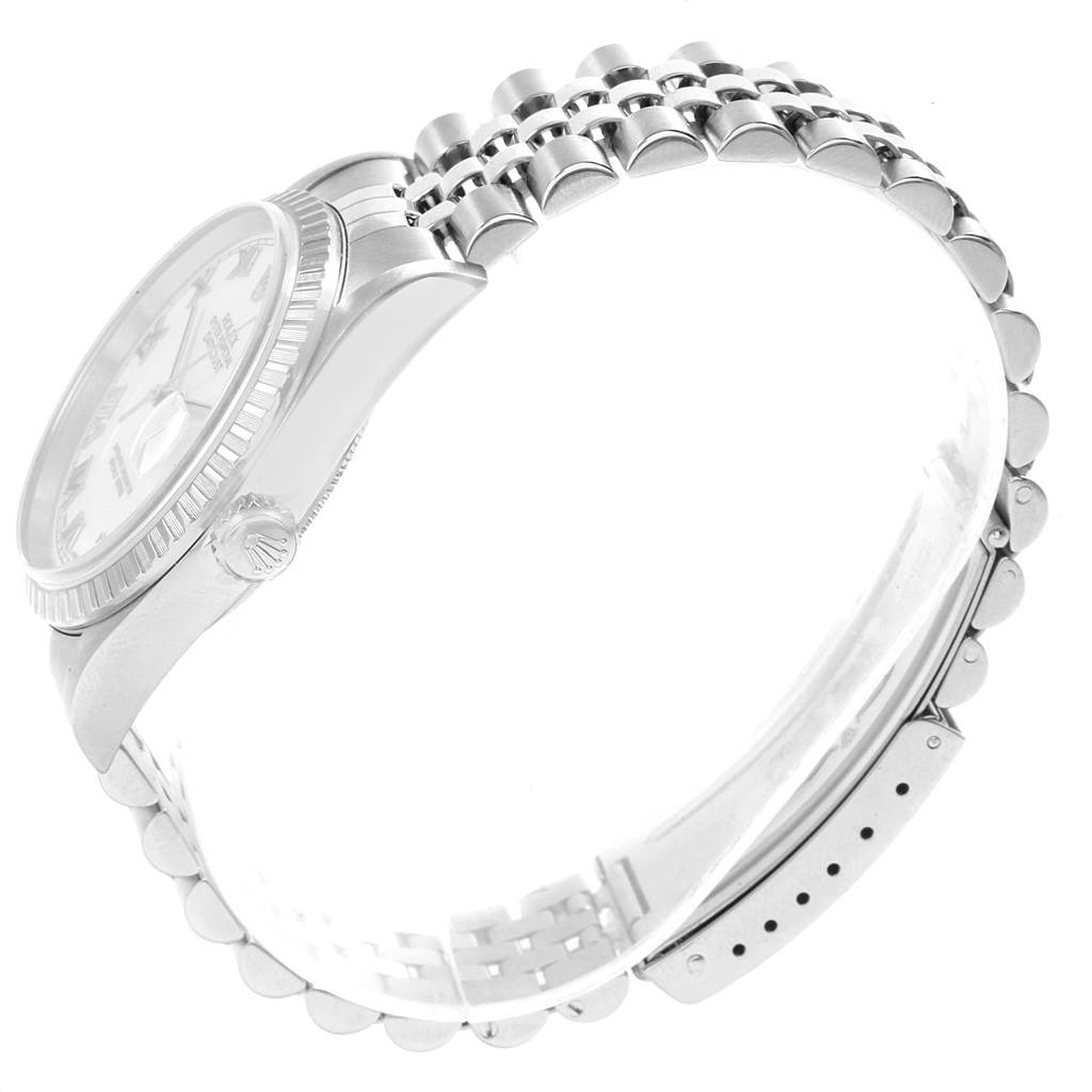 This image shows the side view of a Rolex Datejust 16220 Men
s Stainless Steel White Dial 16220 Men
s Stainless Steel White Dial watch, highlighting the case, bezel, and the jubilee bracelet.