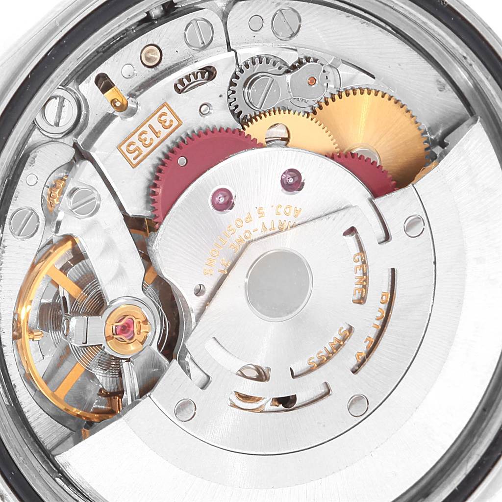 This is a close-up view of the movement mechanism of a Rolex Datejust 16200 Men's Stainless Steel Black Dial 16200 Men's Stainless Steel Black Dial watch, showing gears and internal components.