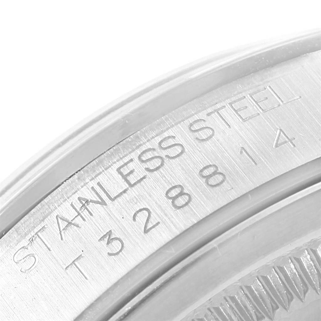 The image shows a close-up of the case back edge of a Rolex Datejust 16200 Men's Stainless Steel Black Dial 16200 Men's Stainless Steel Black Dial model, highlighting the stainless steel material.