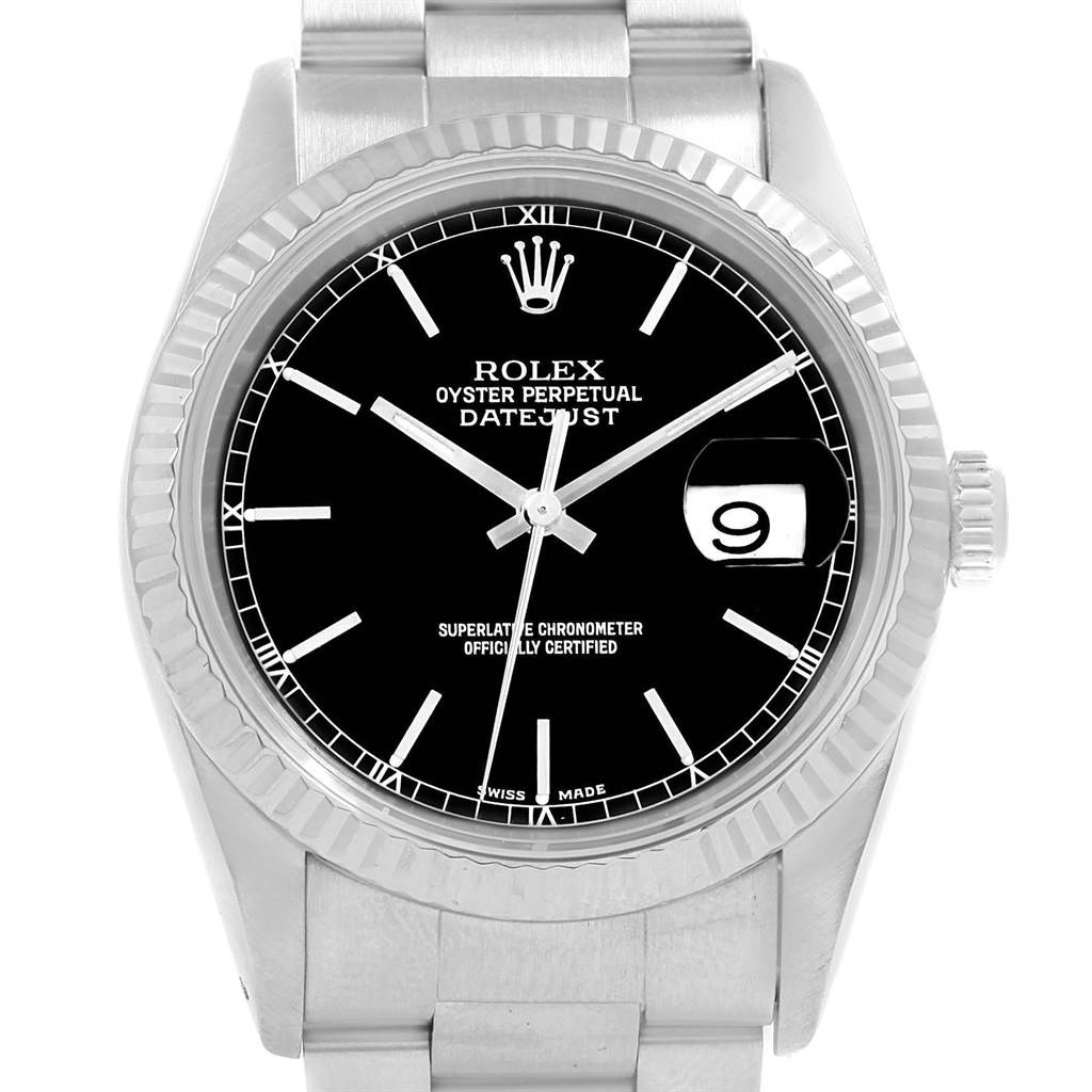 The image shows a front view of a Rolex Datejust 16220 Men's Stainless Steel Black Dial 16220 Men's Stainless Steel Black Dial watch displaying its dial, hour markers, hands, and date window.