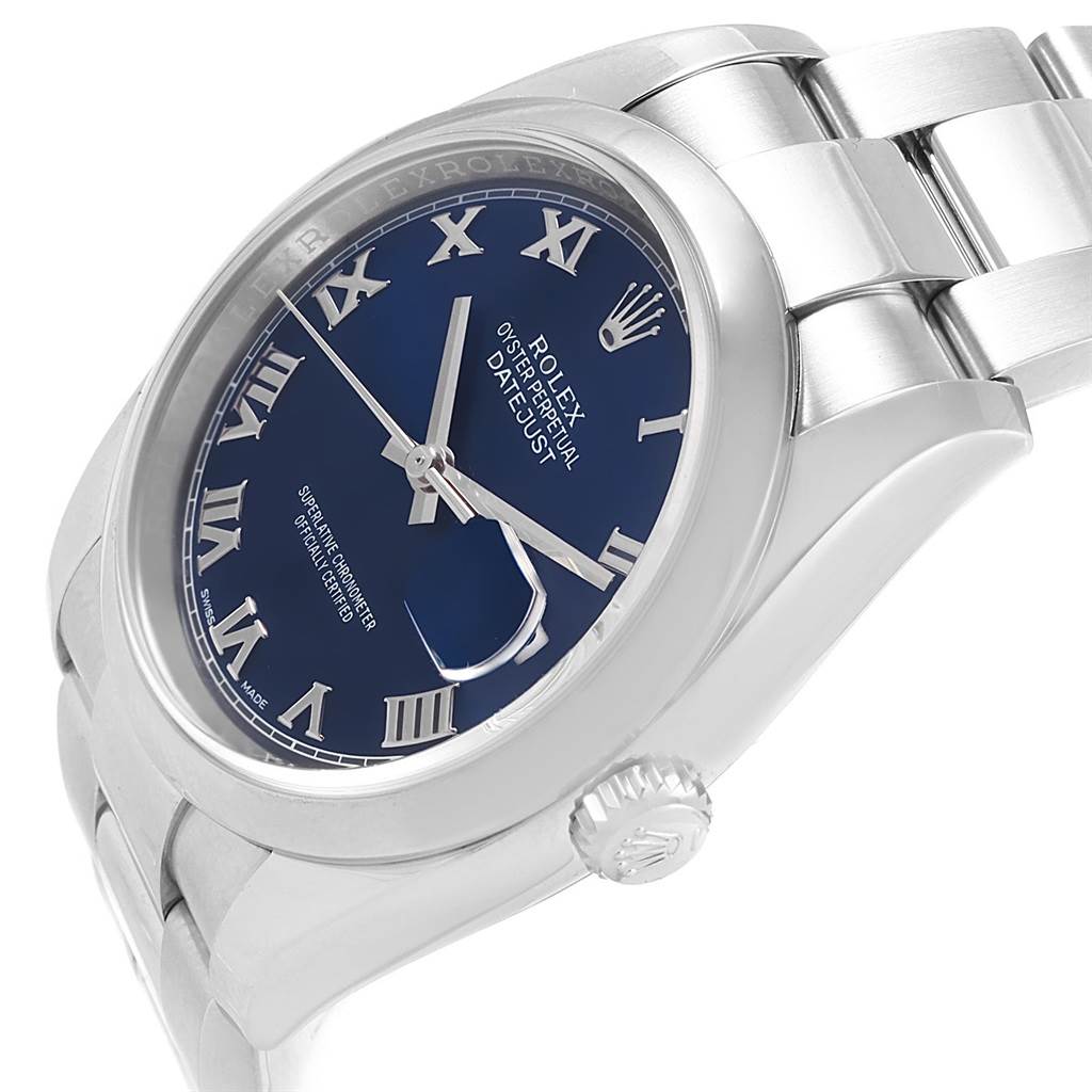 The image shows a close-up angle of the blue dial, crown, and part of the stainless steel bracelet of a Rolex Datejust 116200 Men's Stainless Steel Blue Dial 116200 Men's Stainless Steel Blue Dial watch.