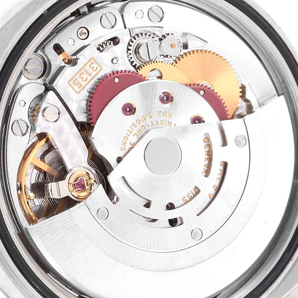 The image shows a close-up view of the movement mechanism of the Rolex Datejust 116234 Men's Stainless Steel Mother of Pearl Dial 116234 Men's Stainless Steel Mother of Pearl Dial watch.