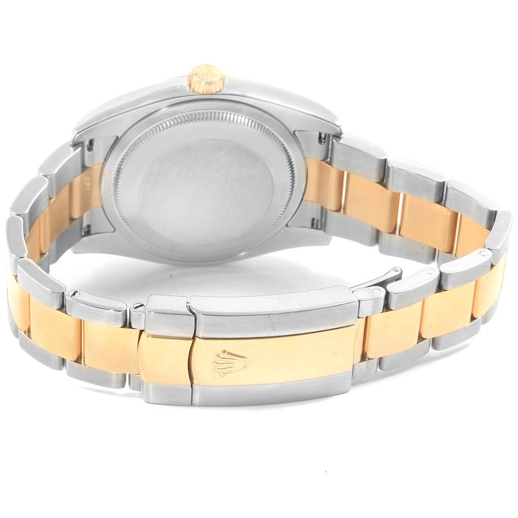 This image shows the back view of a Rolex Datejust 116203 Men's Stainless Steel Black Dial 116203 Men's Stainless Steel Black Dial watch, highlighting the two-tone bracelet and closed clasp.