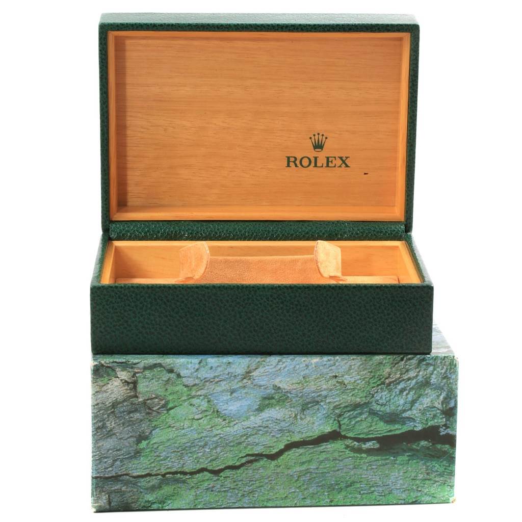 This image shows an open Rolex watch box, likely for the Datejust model, revealing the interior compartments.