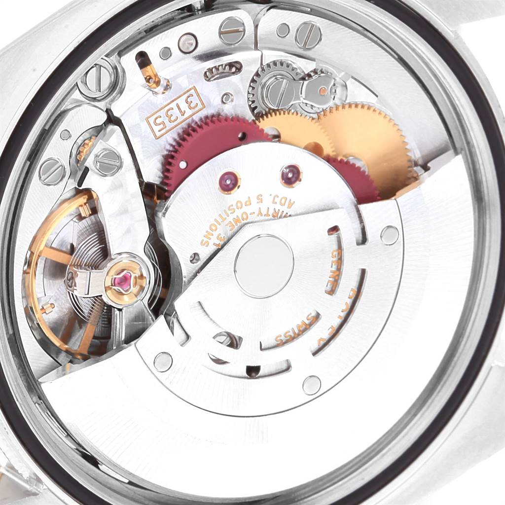 This image shows a close-up view of the movement and internal mechanisms of the Rolex Datejust 116203 Men's Stainless Steel Mother of Pearl Dial 116203 Men's Stainless Steel Mother of Pearl Dial watch.