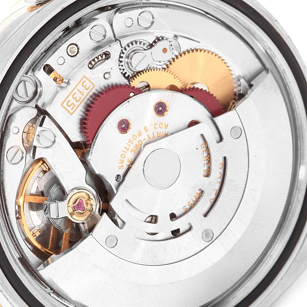 The image shows the internal movement mechanism of the Rolex Datejust 116203 Men's Steel and Gold (two tone) Silver Dial 116203 Men's Steel and Gold (two tone) Silver Dial watch, viewed from the back.