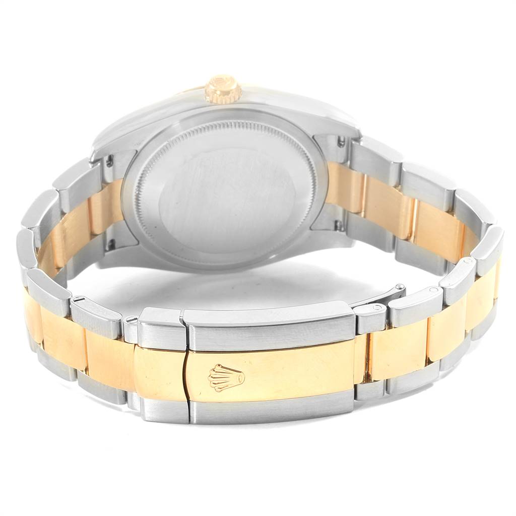 The image shows the back view of a Rolex Datejust 116203 Men's Steel and Gold (two tone) Silver Dial 116203 Men's Steel and Gold (two tone) Silver Dial watch highlighting its clasp and bracelet.