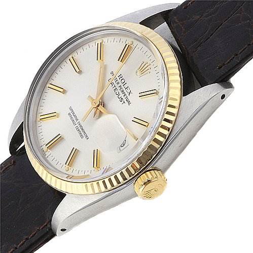 The image shows a Rolex Datejust watch at an oblique angle highlighting its gold fluted bezel, white dial, and leather strap.