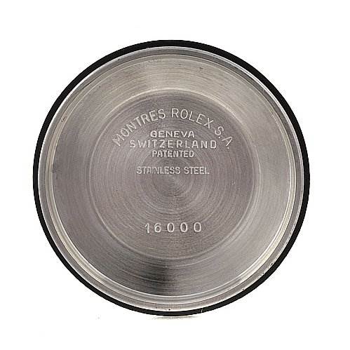 This image shows the inside case back of a Rolex Datejust 16013 Men's Steel and Gold (two tone) Silver Dial 16013 Men's Steel and Gold (two tone) Silver Dial, featuring engraved details including the brand, location, and model number.