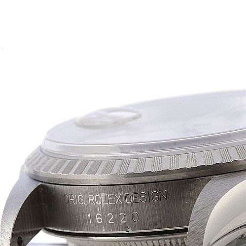 This image shows a close-up angle of the side of a Rolex Datejust 16220 Men's Stainless Steel Silver Dial 16220 Men's Stainless Steel Silver Dial model, highlighting the bezel and case with "ORIG. ROLEX DESIGN 16220" engraved.