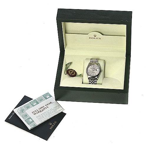 The image shows a Rolex Datejust 16220 Men's Stainless Steel Silver Dial 16220 Men's Stainless Steel Silver Dial watch in its open box, with accompanying warranty cards and a Rolex tag.