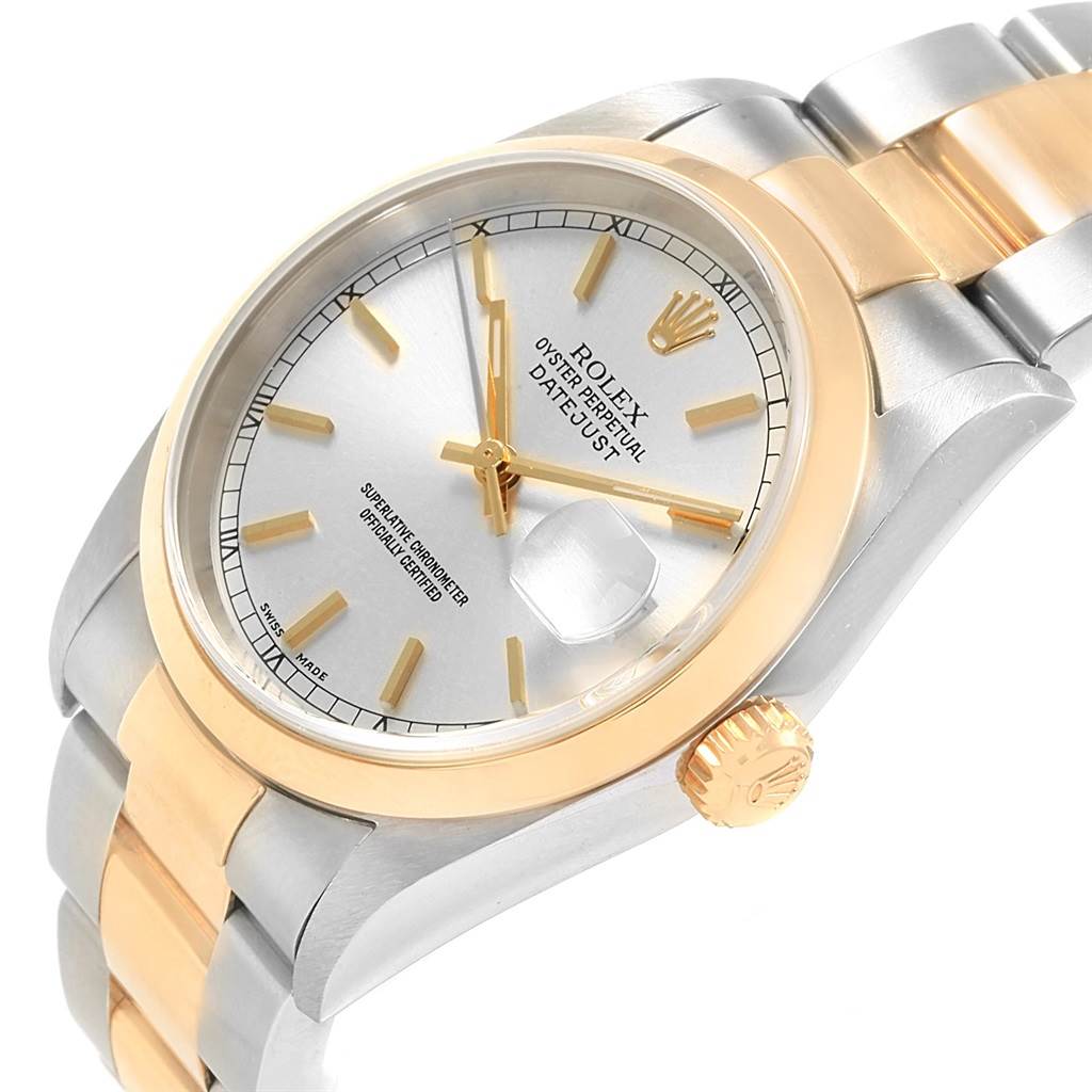 The image shows a close-up angle of a Rolex Datejust 16203 Men's Steel and Gold (two tone) Silver Dial 16203 Men's Steel and Gold (two tone) Silver Dial watch, highlighting its face, crown, and part of the bracelet.