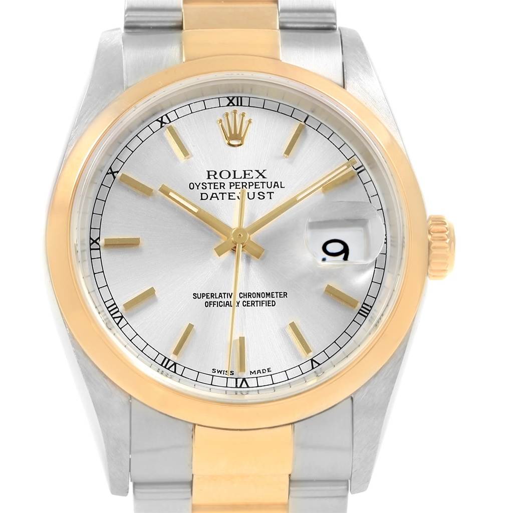 The Rolex Datejust 16203 Men's Steel and Gold (two tone) Silver Dial 16203 Men's Steel and Gold (two tone) Silver Dial watch is shown from a frontal angle, displaying the dial, hands, date window, and part of the bracelet.