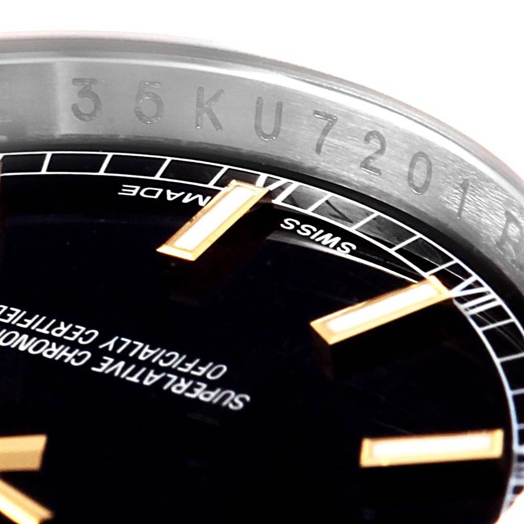 Close-up angle showing the bezel and partial dial of a Rolex Datejust 116203 Men's Stainless Steel Black Dial 116203 Men's Stainless Steel Black Dial watch.