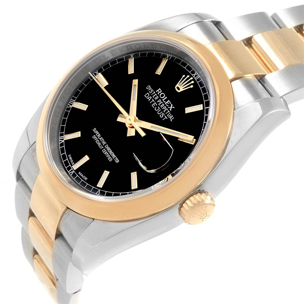 The image shows a close-up side angle of a Rolex Datejust 116203 Men's Stainless Steel Black Dial 116203 Men's Stainless Steel Black Dial watch, highlighting its black dial, gold bezel, and two-tone bracelet.