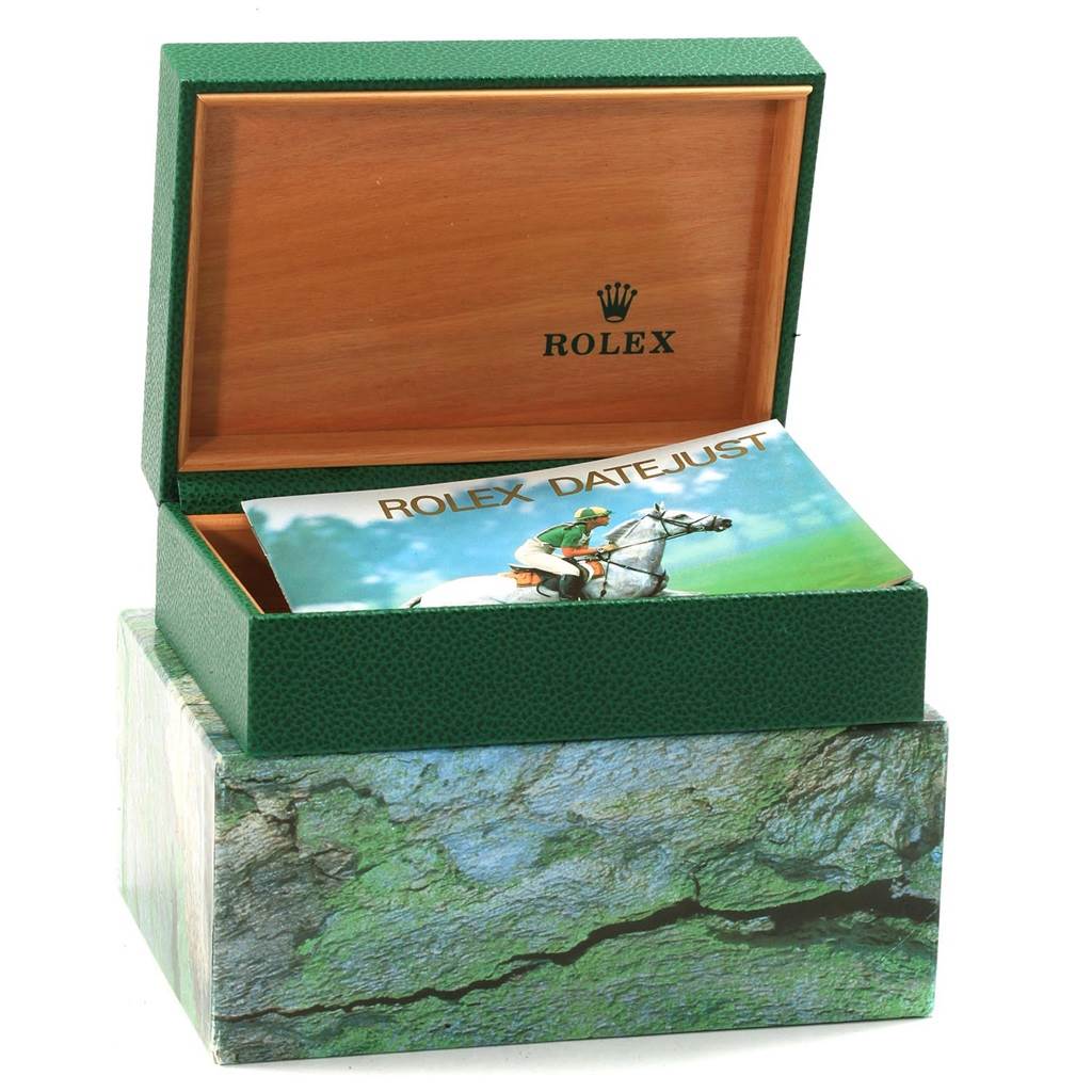 The image shows a Rolex Datejust 16233 Men's Steel and Gold (two tone) Champagne Dial 16233 Men's Steel and Gold (two tone) Champagne Dial watch box and booklet, photographed at a slightly elevated front angle.