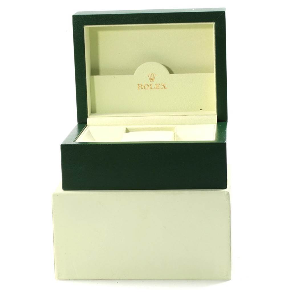 This image shows an open green watch box for the Rolex Datejust 116233 Men's Stainless Steel Champagne Dial 116233 Men's Stainless Steel Champagne Dial model, with the lid and interior compartments visible.