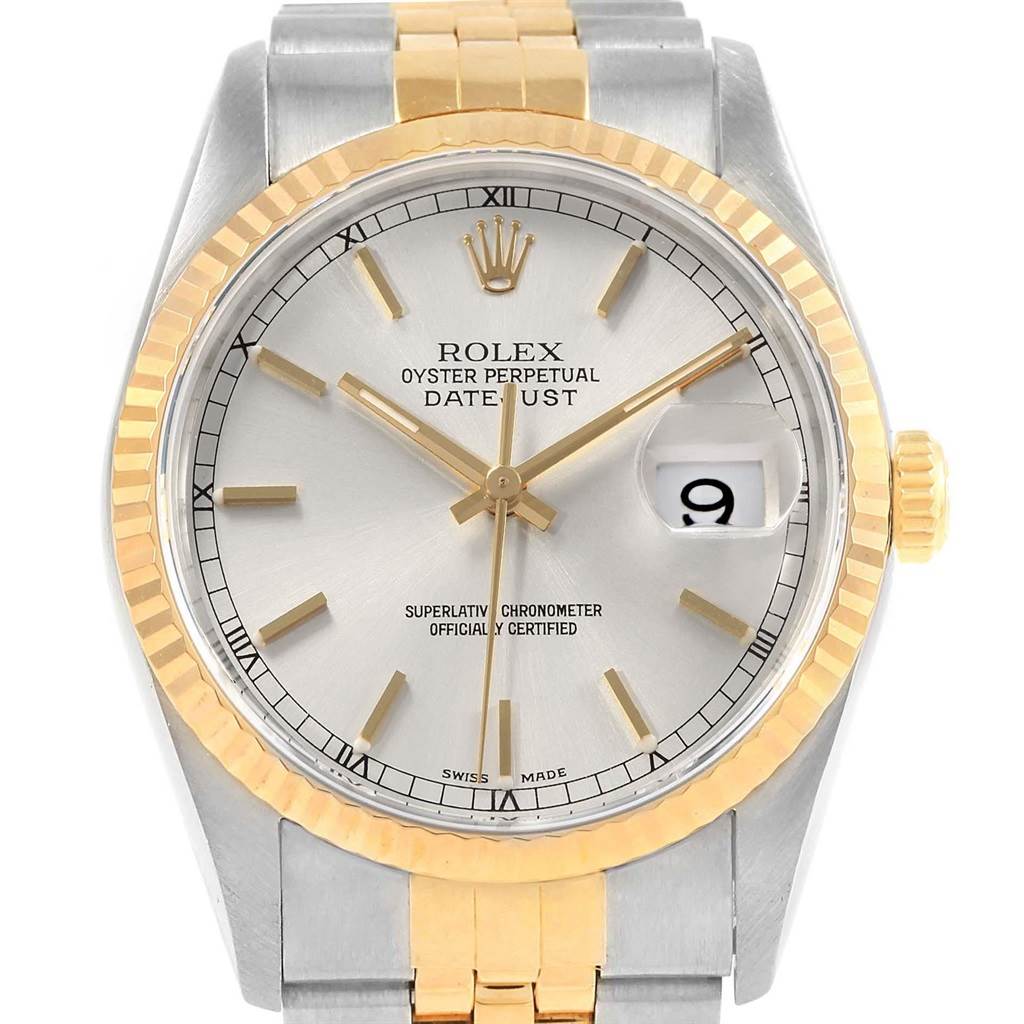This is a front view of a Rolex Datejust 16233 Men's Steel and Gold (two tone) Silver Dial 16233 Men's Steel and Gold (two tone) Silver Dial watch, displaying its face, bezel, crown, and part of its two-tone bracelet.
