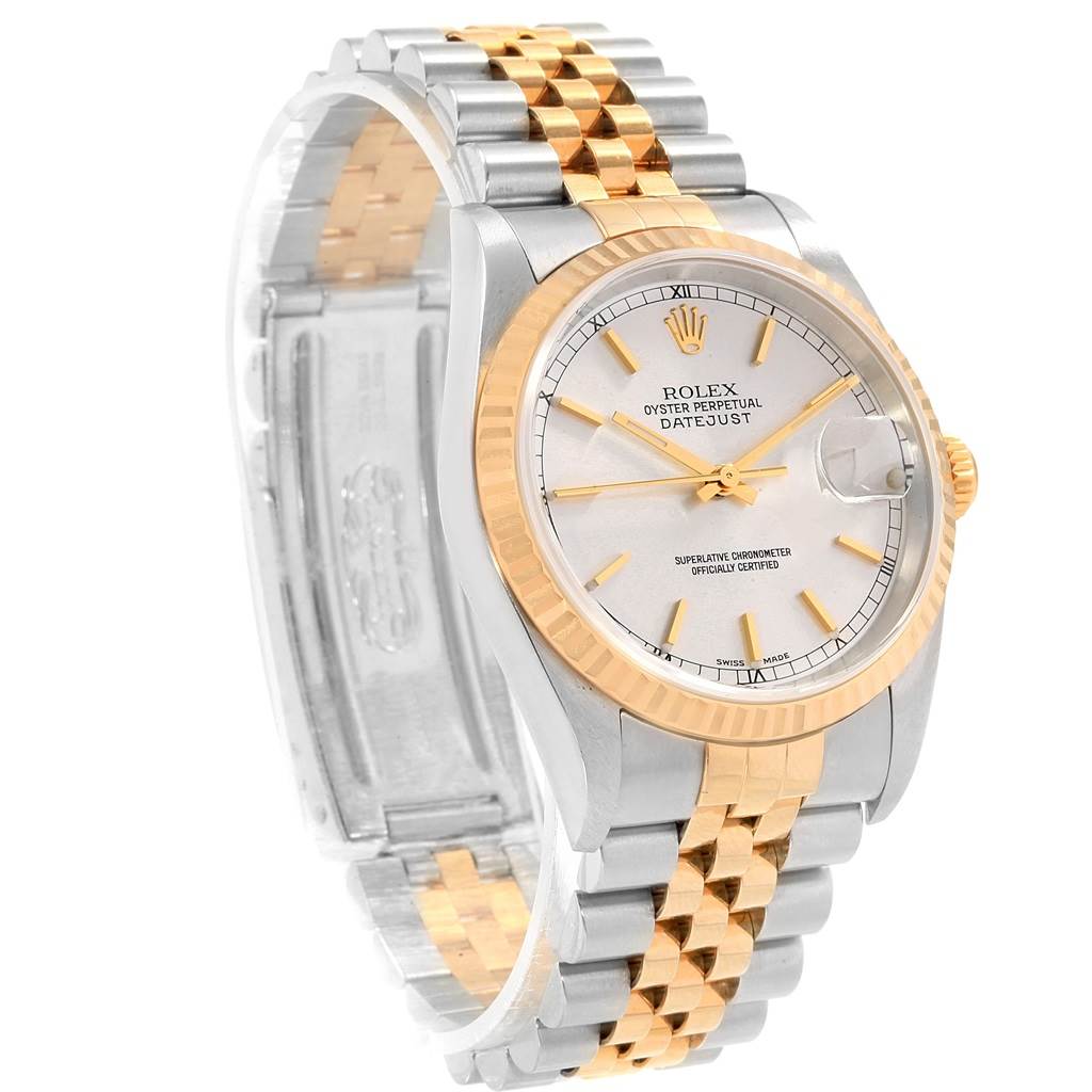 The Rolex Datejust 16233 Men's Steel and Gold (two tone) Silver Dial 16233 Men's Steel and Gold (two tone) Silver Dial model watch is shown at a three-quarter angle, displaying its dial, bezel, and two-tone bracelet.
