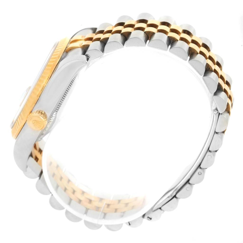 This image shows a side view of the Rolex Datejust 116233 Men's Stainless Steel Black Dial 116233 Men's Stainless Steel Black Dial watch, highlighting the crown, case, and two-tone bracelet.