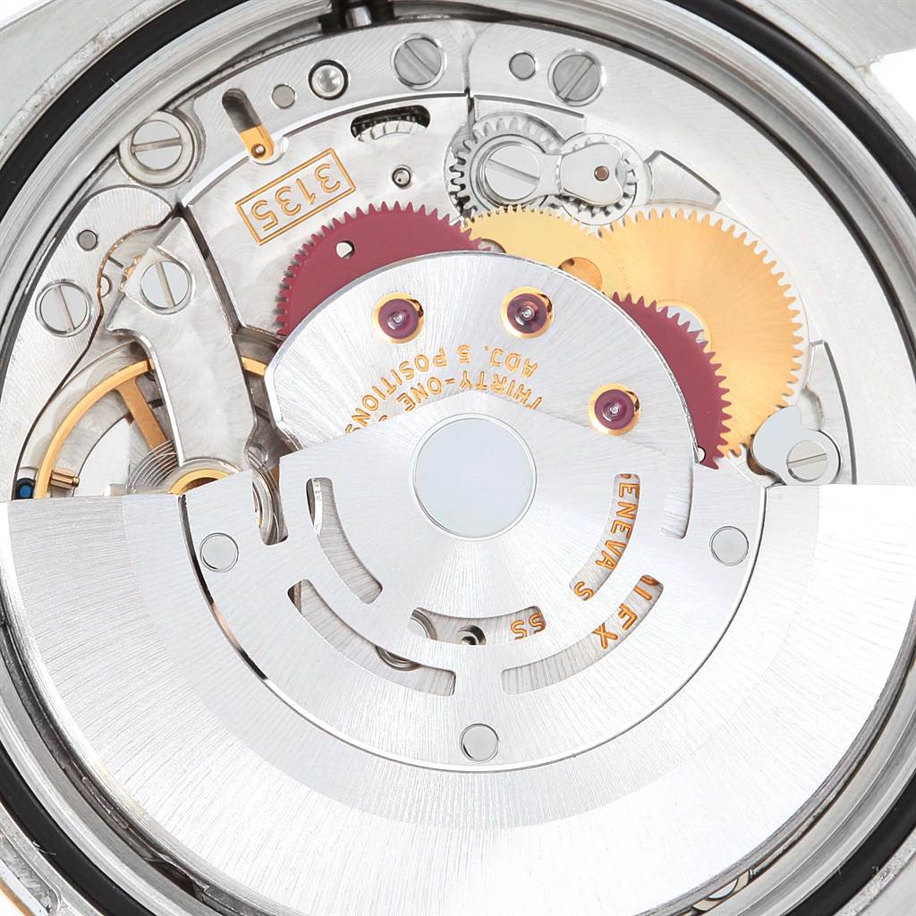 This is a close-up view of the inner mechanical movement of a Rolex Datejust 116233 Men's Stainless Steel Champagne Dial 116233 Men's Stainless Steel Champagne Dial watch.