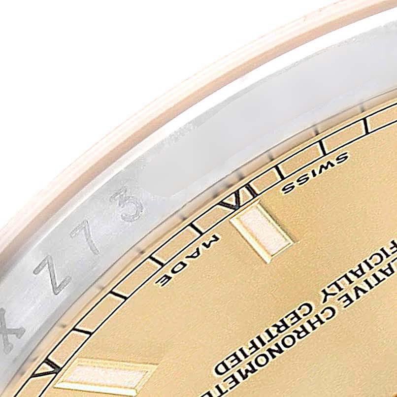 The image shows a close-up of the dial edge and serial number engraving of a Rolex Datejust 116203 Men's Stainless Steel Champagne Dial 116203 Men's Stainless Steel Champagne Dial watch.