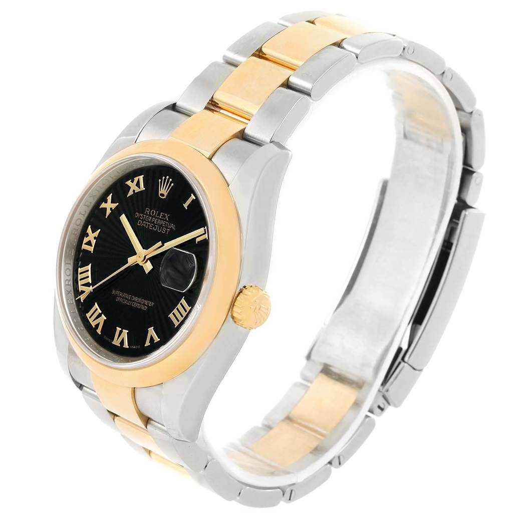 The image shows a front angle of a Rolex Datejust 116203 Men
s Stainless Steel Black Dial 116203 Men
s Stainless Steel Black Dial watch, highlighting the black dial, gold bezel, and two-tone bracelet.