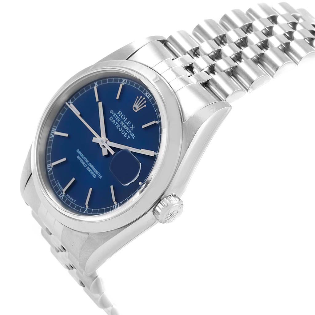 The image shows a side-angle view of a Rolex Datejust 16200 Men's Stainless Steel Blue Dial 16200 Men's Stainless Steel Blue Dial watch, highlighting its blue dial, bezel, crown, and part of the bracelet.