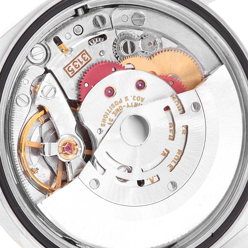 This image shows a close-up view of the internal movements and mechanisms of a Rolex Datejust 16233 Men's Steel and Gold (two tone) Beige Dial 16233 Men's Steel and Gold (two tone) Beige Dial watch.