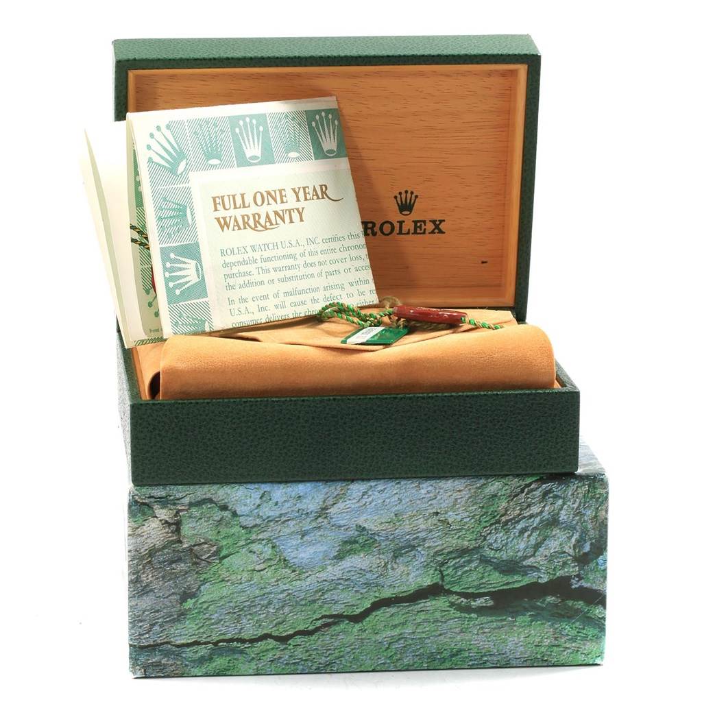 The image shows a Rolex Datejust 16233 Men's Steel and Gold (two tone) Beige Dial 16233 Men's Steel and Gold (two tone) Beige Dial watch box containing warranty papers and a tag, viewed from a slightly above front angle.