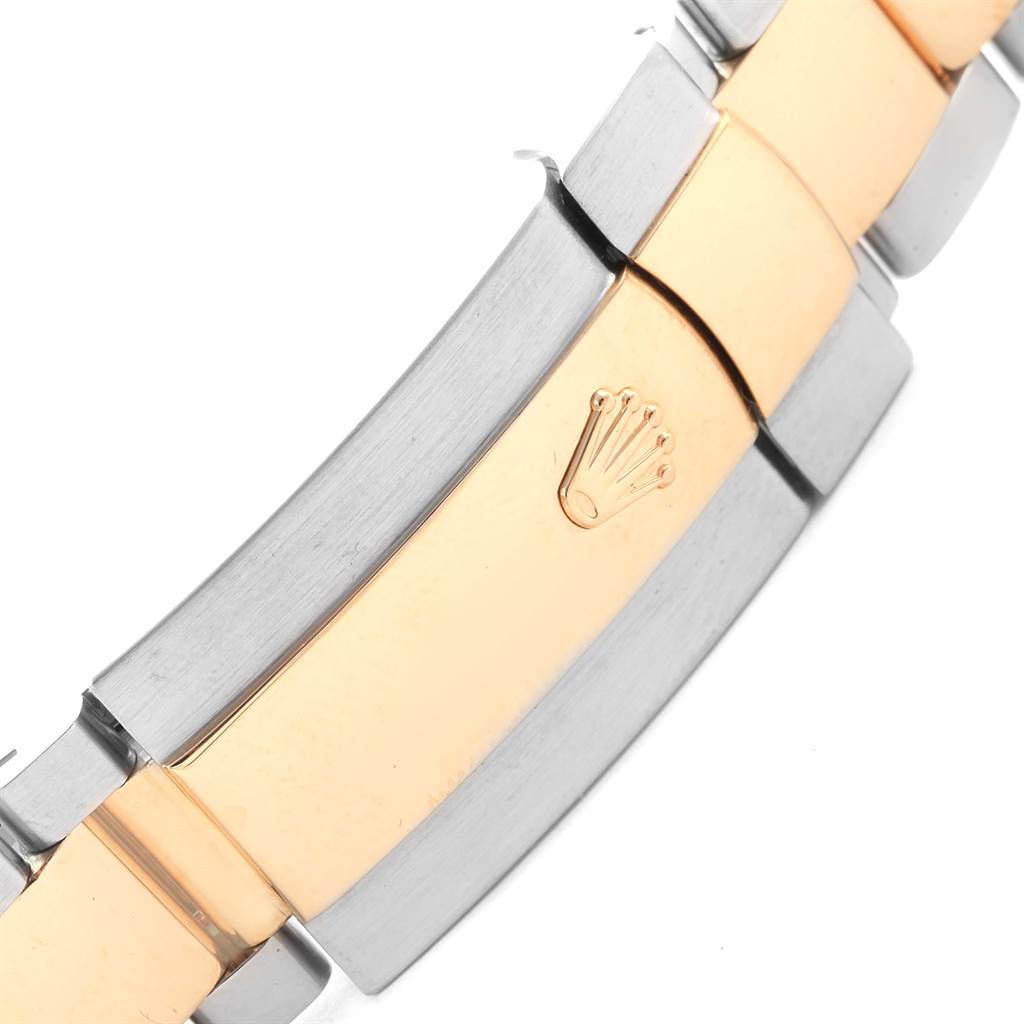 The image shows a close-up of the bracelet section of a Rolex Datejust 116203 Men's Stainless Steel White Dial 116203 Men's Stainless Steel White Dial watch, featuring a two-tone design and the Rolex crown logo.