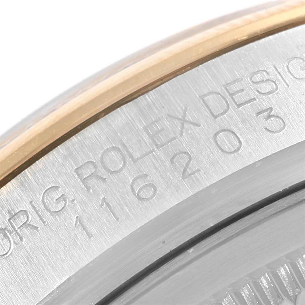 This image shows a close-up of the side engraving on the case back of a Rolex Datejust 116203 Men's Stainless Steel White Dial 116203 Men's Stainless Steel White Dial watch.