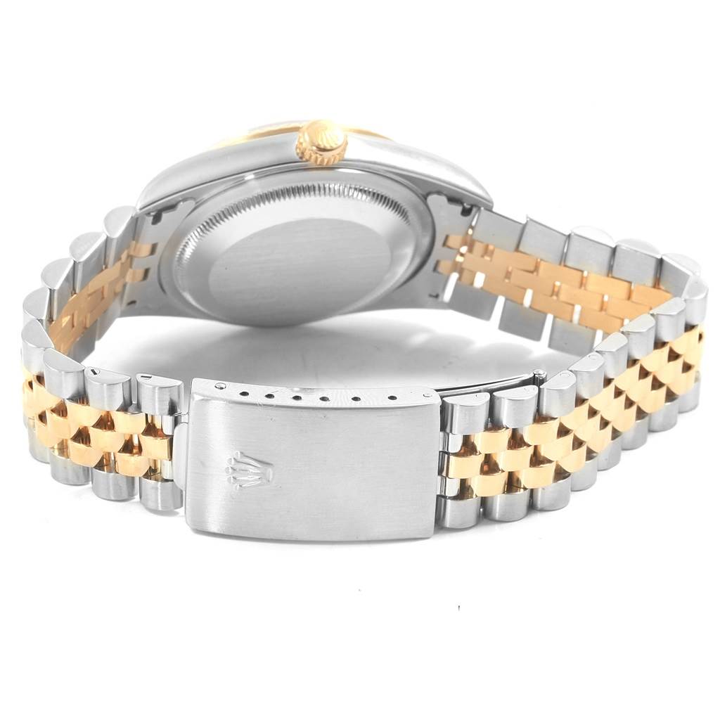 The image shows the back of a Rolex Datejust 16233 Men's Steel and Gold (two tone) Blue Dial 16233 Men's Steel and Gold (two tone) Blue Dial, highlighting the case back, crown, and two-tone Jubilee bracelet.