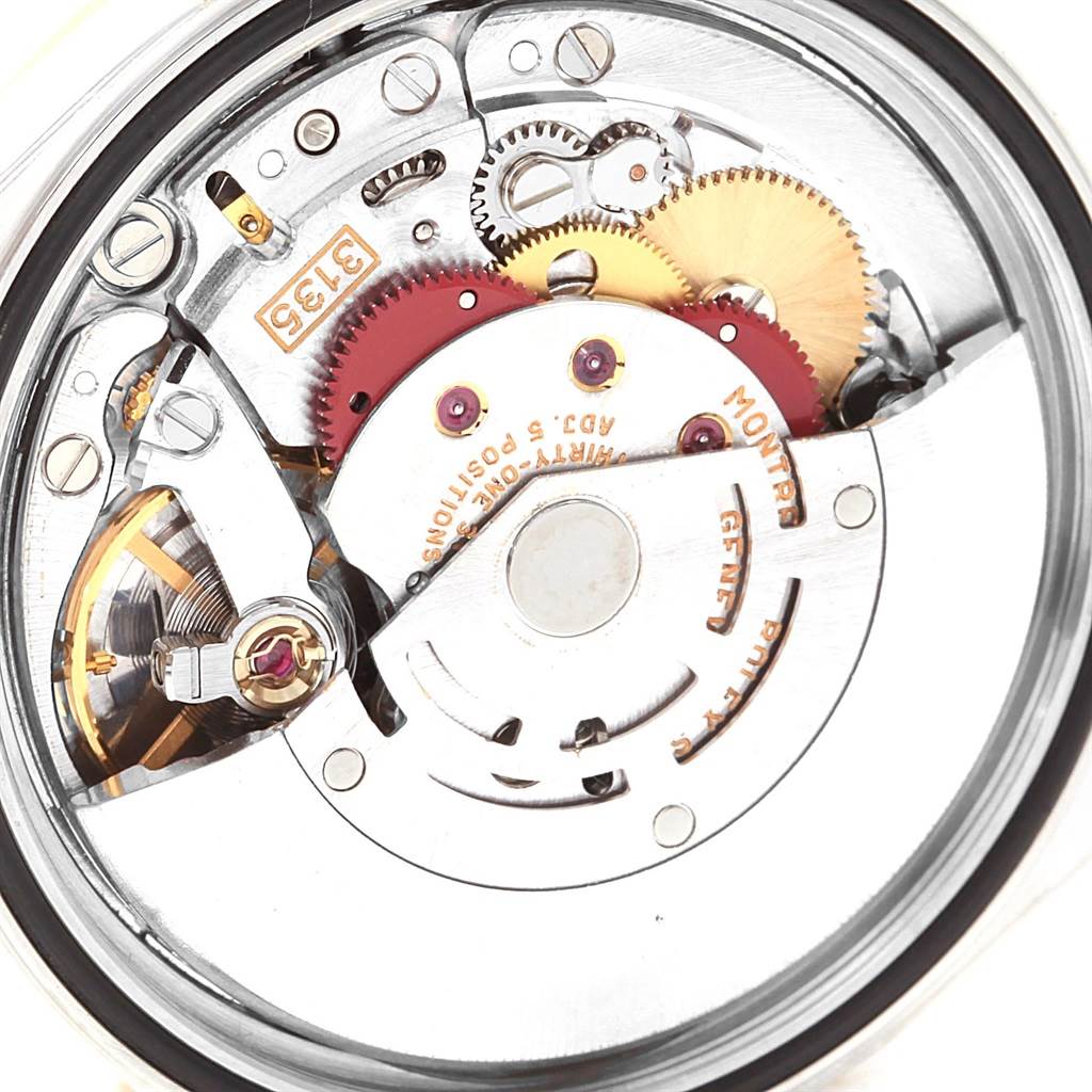 This image shows a close-up of the movement mechanism inside a Rolex Datejust 16233 Men's Steel and Gold (two tone) Champagne Dial 16233 Men's Steel and Gold (two tone) Champagne Dial watch.