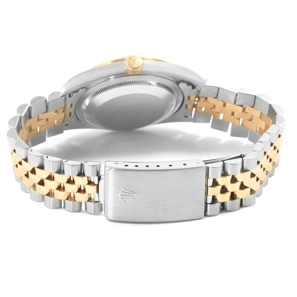 The image shows a rear angle of the Rolex Datejust 16233 Men's Steel and Gold (two tone) Champagne Dial 16233 Men's Steel and Gold (two tone) Champagne Dial, focusing on the bracelet and clasp.