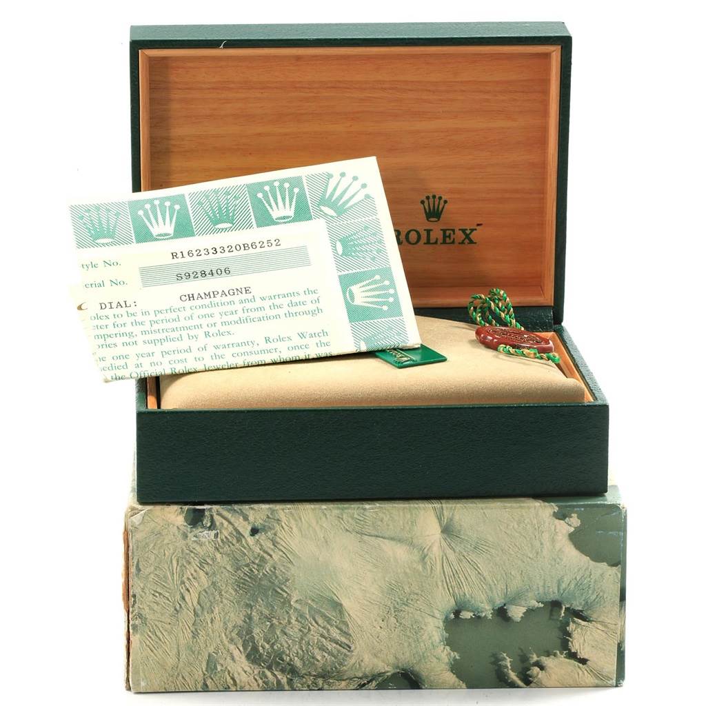 The image shows the packaging, warranty card, and tags for a Rolex Datejust 16233 Men's Steel and Gold (two tone) Champagne Dial 16233 Men's Steel and Gold (two tone) Champagne Dial watch.