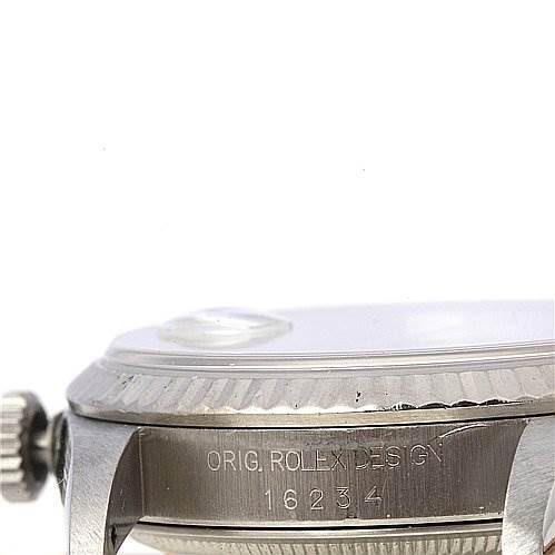 The image shows a close-up side view of a Rolex Datejust 16234 Men's Stainless Steel White Dial 16234 Men's Stainless Steel White Dial watch, highlighting the crown, bezel, and the "ORIG.ROLEX DESIGN 16234" engraving.