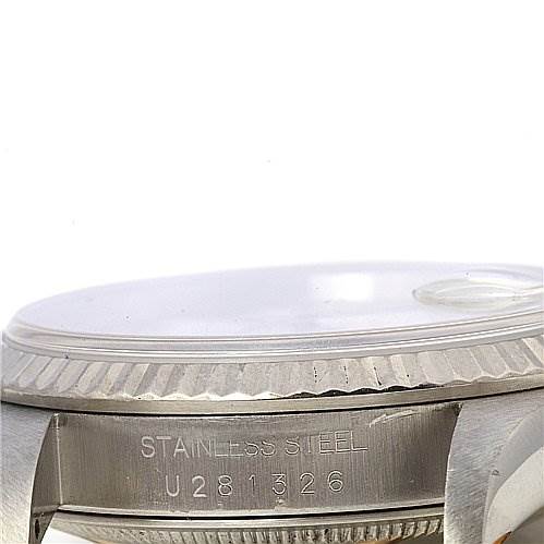 This image shows a close-up side view of the Rolex Datejust 16234 Men's Stainless Steel White Dial 16234 Men's Stainless Steel White Dial watch, highlighting the case, bezel, and part of the bracelet attachment with visible engravings.