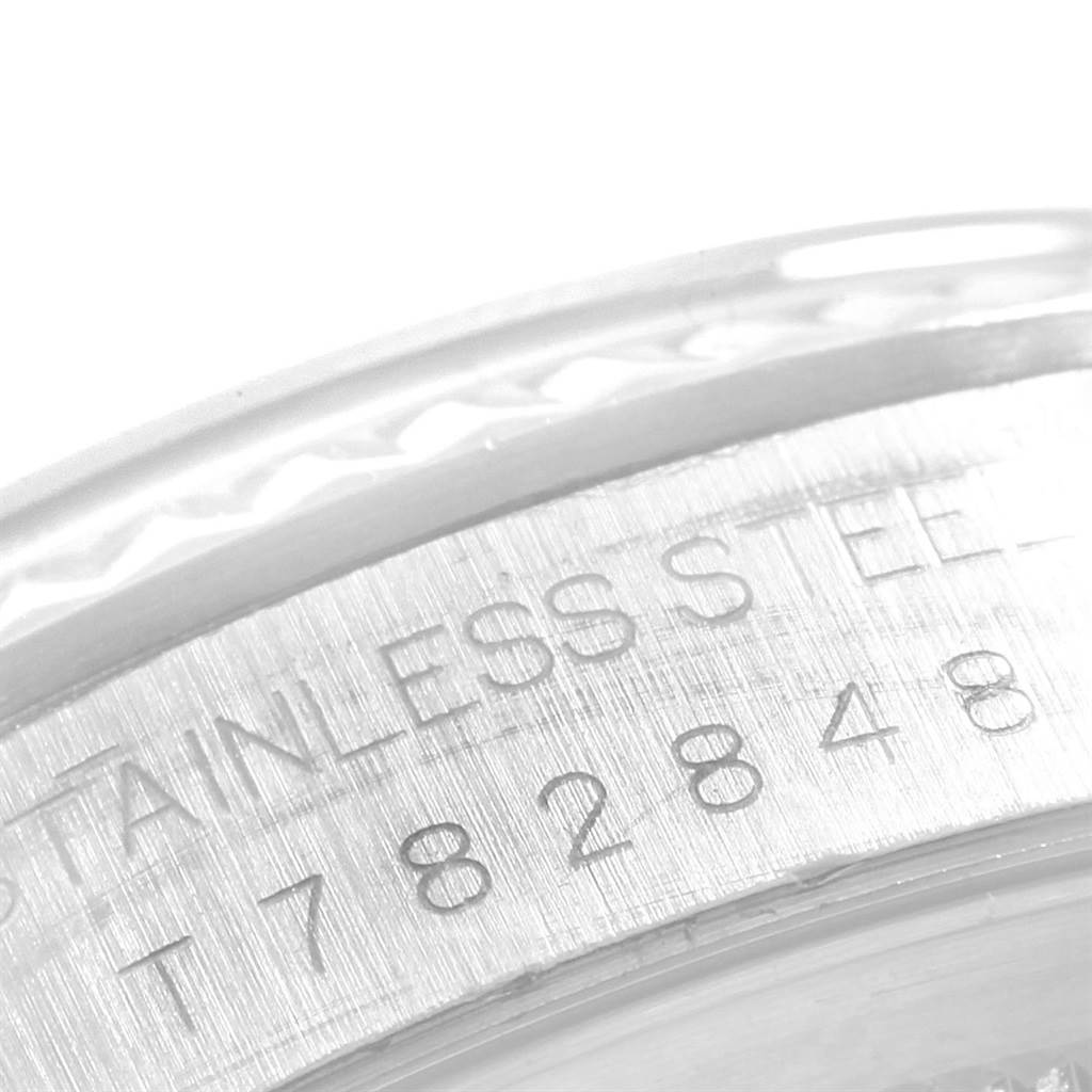 This close-up shows the stainless steel engraving and serial number area of the Rolex Datejust 16234 Men's Stainless Steel Silver Dial 16234 Men's Stainless Steel Silver Dial watch.
