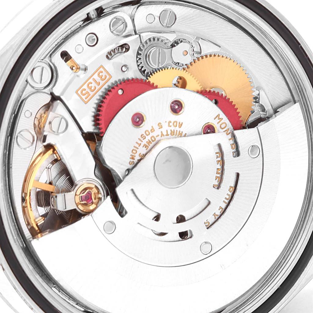 The image shows a close-up view of the inner mechanical workings of a Rolex Datejust 16234 Men's Stainless Steel Silver Dial 16234 Men's Stainless Steel Silver Dial watch.