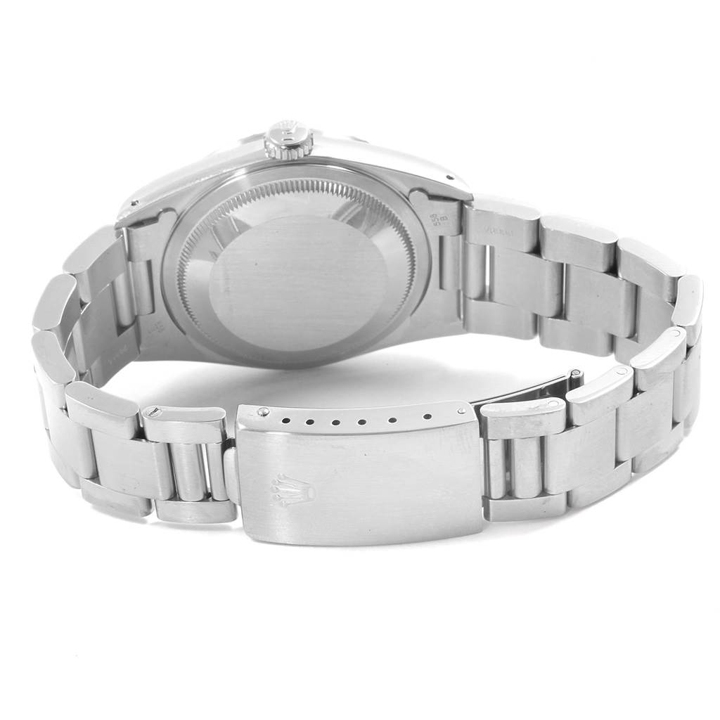The image shows the back view of a Rolex Datejust 16220 Men's Stainless Steel Silver Dial 16220 Men's Stainless Steel Silver Dial watch, highlighting the case back, bracelet, and clasp.