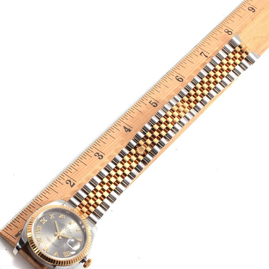 The image shows a Rolex Datejust 116233 Men's Stainless Steel Silver Dial 116233 Men's Stainless Steel Silver Dial watch laid flat with its watch face and bracelet measured against a ruler.