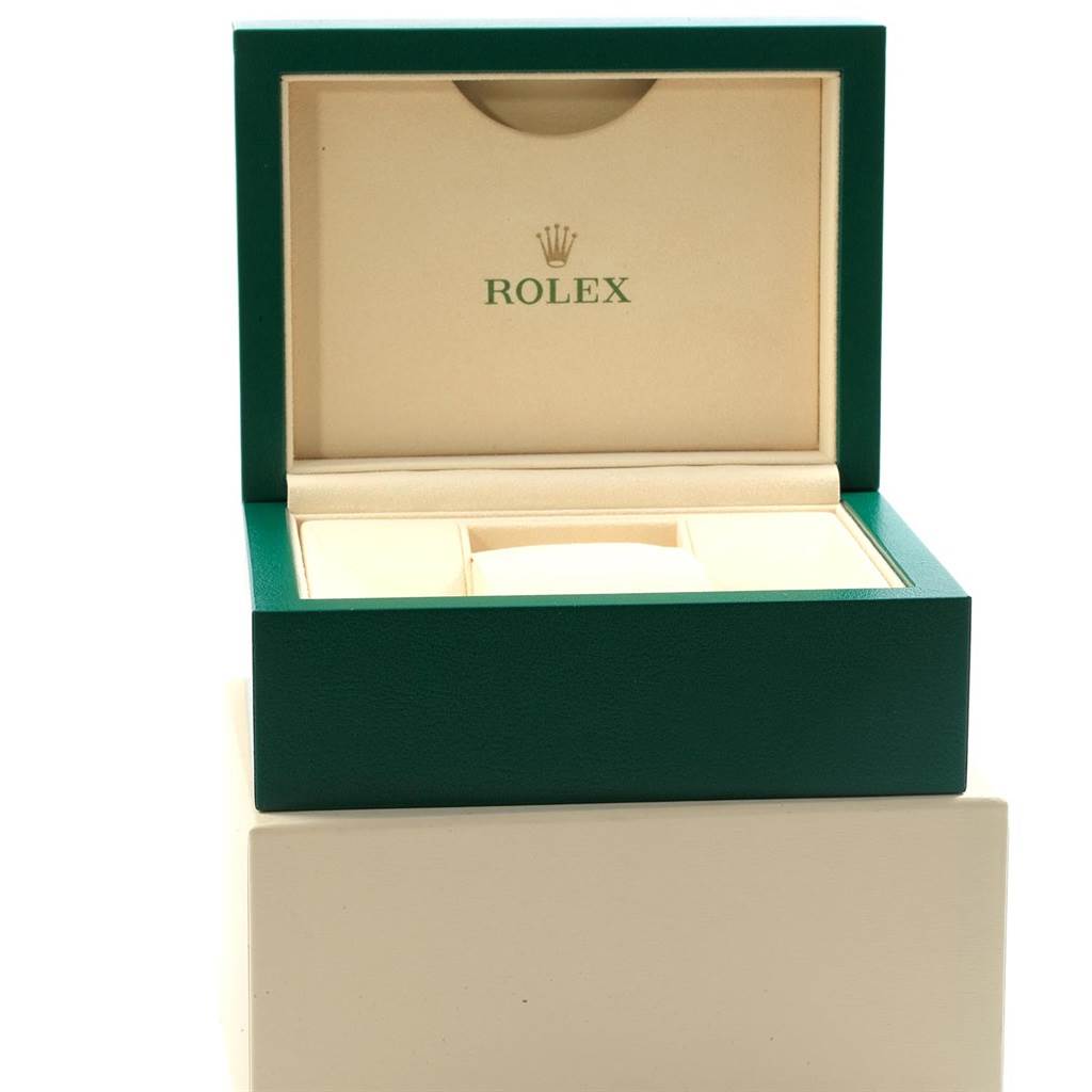 The image shows an open Rolex Datejust 116233 Men's Stainless Steel Silver Dial 116233 Men's Stainless Steel Silver Dial watch box with green exterior and beige interior.