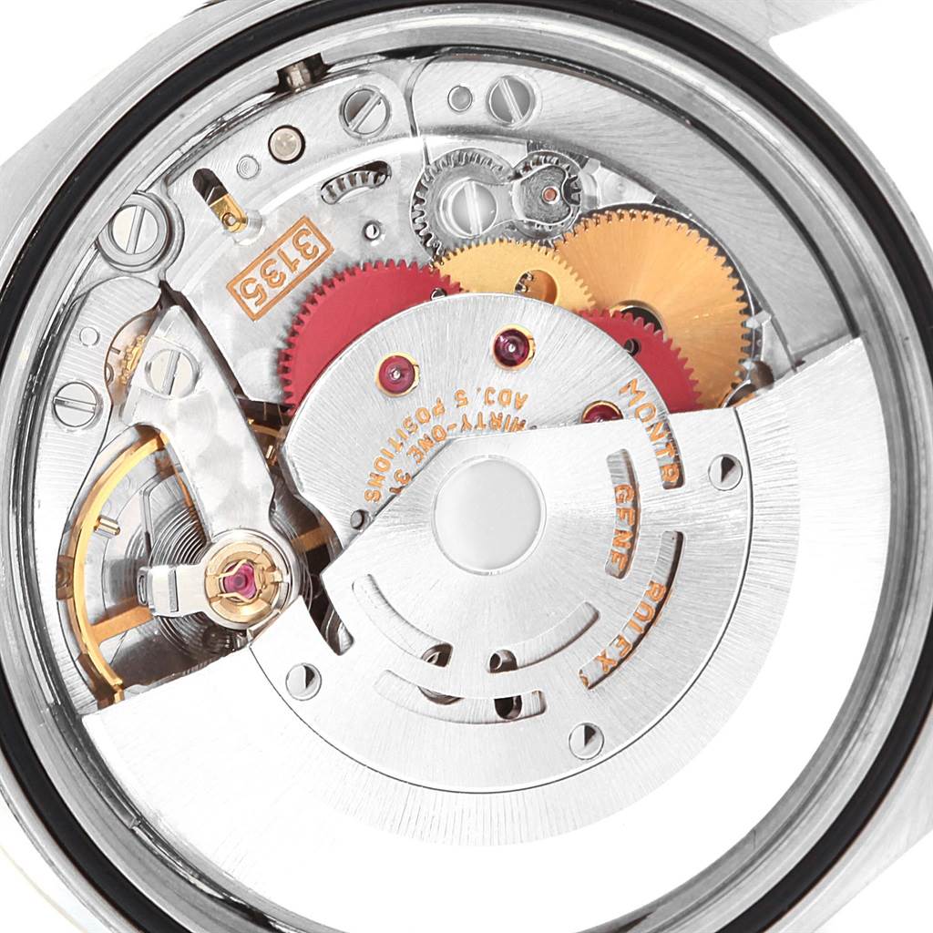 The image shows the internal mechanism and movement of a Rolex Datejust 16220 Men's Stainless Steel Grey Dial 16220 Men's Stainless Steel Grey Dial watch from a close-up angle.