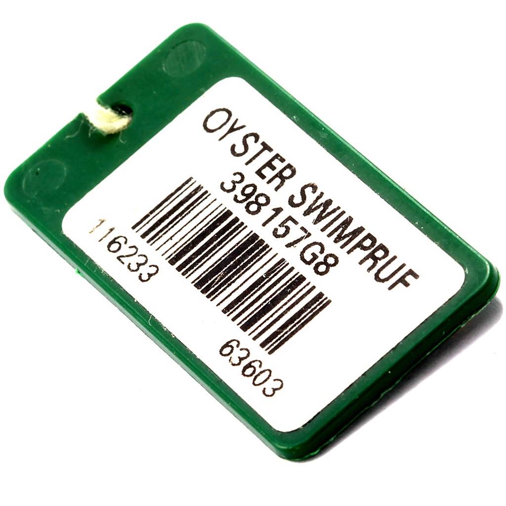 This image shows a green tag labeled "OYSTER SWIMPRUF" with a barcode, associated with the Datejust model by Rolex.