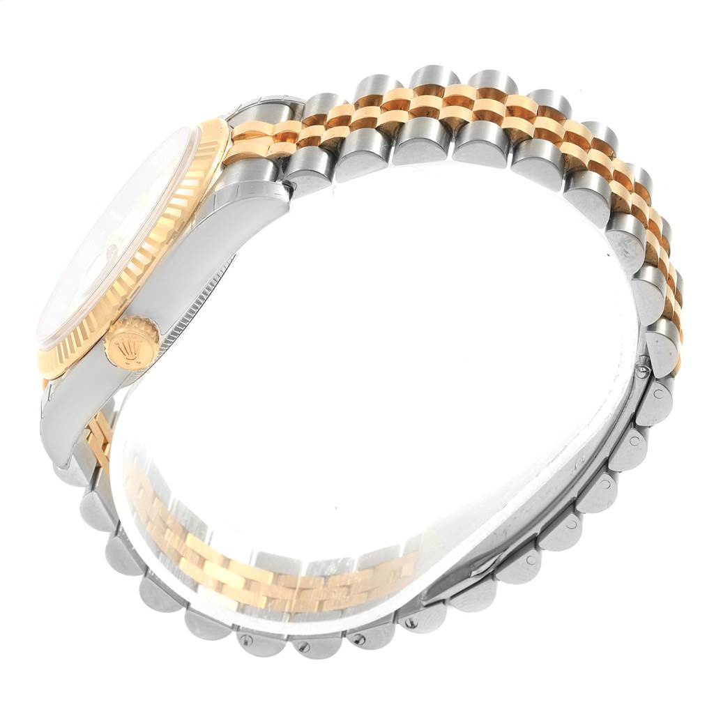 This image shows a side and partial overhead view of a Rolex Datejust 116233 Men's Stainless Steel White Dial 116233 Men's Stainless Steel White Dial watch, highlighting the crown, case, and two-tone bracelet.